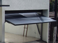 Puerta levadiza maroma